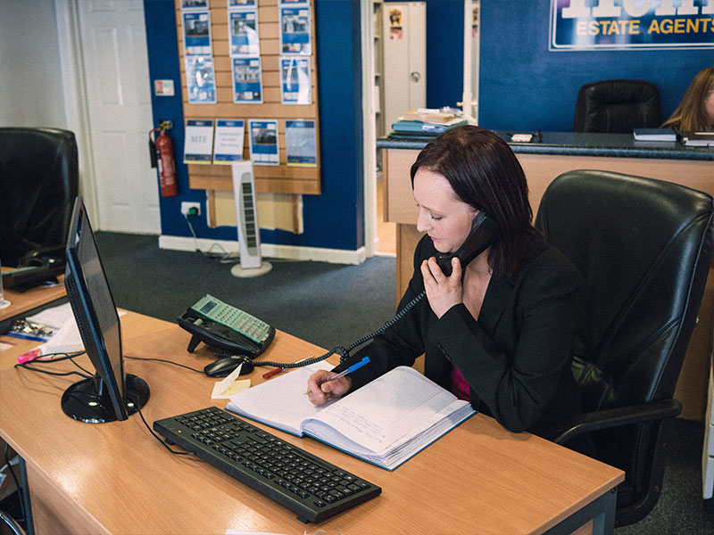 Daniel Henry Staff Member Talking On A Phone About Mortgages