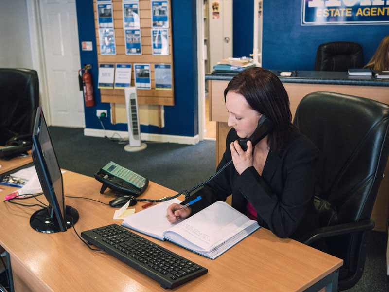 Daniel Henry Staff Member Talking On A Phone About Property Valuations